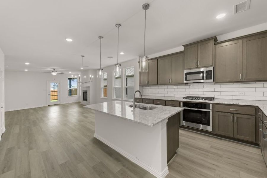 Representative furnished interior of a home built from the Cypress by UnionMain Homes in Edgewater, Fate (Image 8).