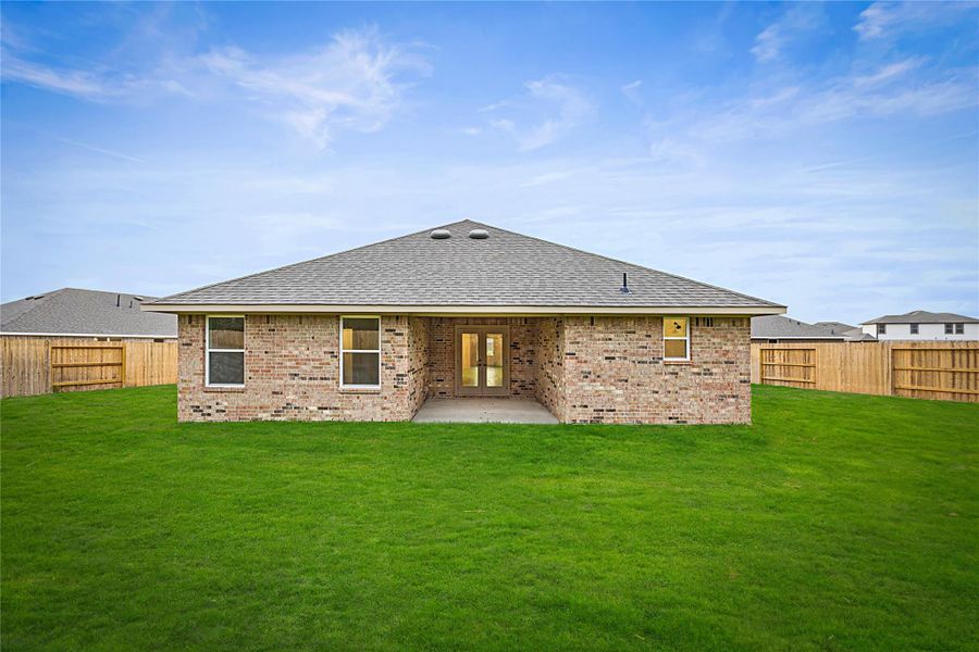 Exterior details and patio area of a home in River Ranch Trails, Dayton (Image 3).