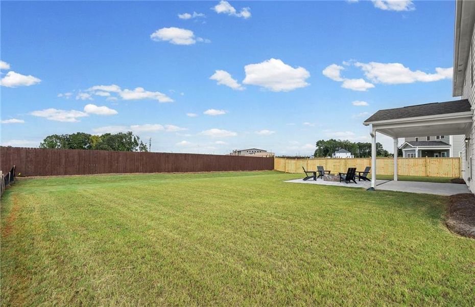 Exterior details and patio area of a home in Creekside at Skelton, Jefferson (Image 30).