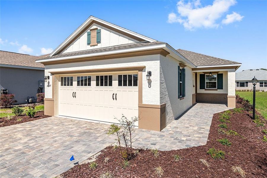 Front exterior of a new home in , Ocala, FL, highlighting curb appeal (Image 25).