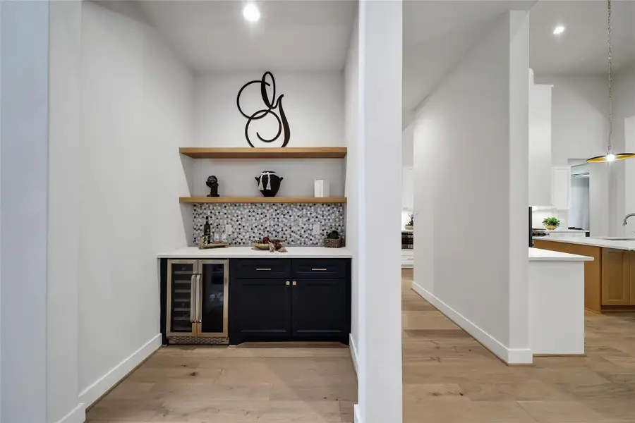 Furnished interior view inside a new home in ARTAVIA, Conroe (Image 28).