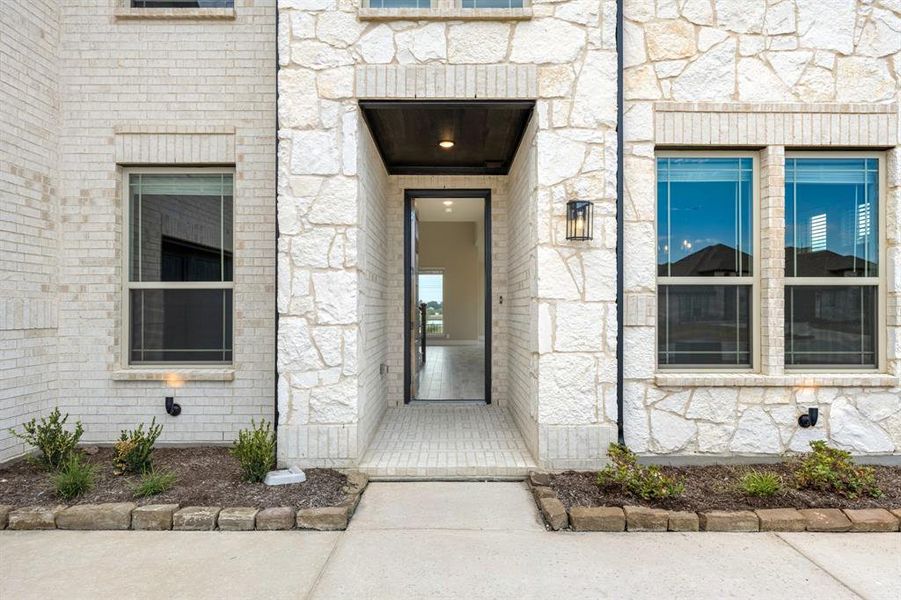 Exterior details and patio area of a home in Devonshire Classic 60-65, Forney (Image 3).