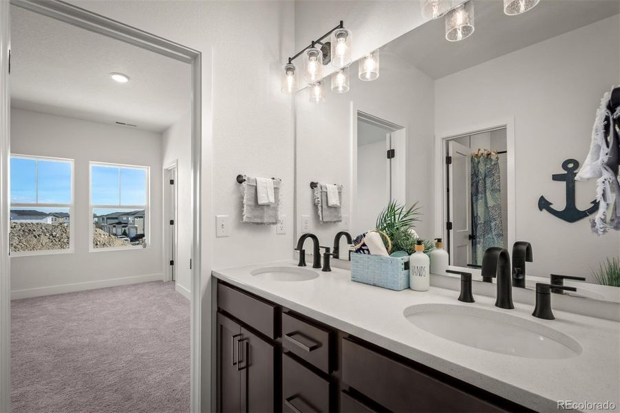 Furnished interior view inside a new home in Revel Crossing at Wolf Ranch - The Panorama Collection, Colorado Springs (Image 15).
