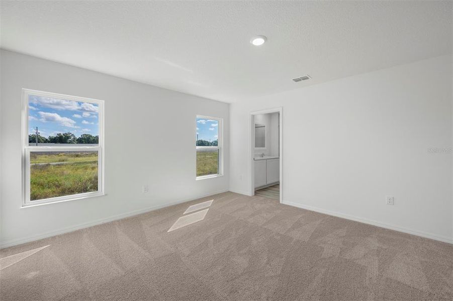 Spacious, unfurnished interior of a new home in Peach Crossings, Winter Haven (Image 28).