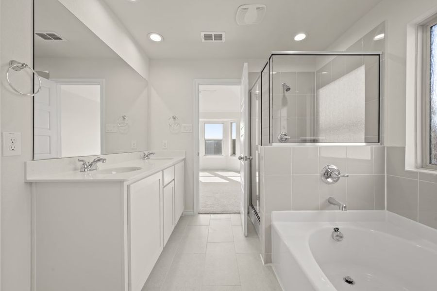 Front exterior of a new home in Myrtle Creek, Waxahachie, TX, highlighting curb appeal (Image 26). Front exterior of a new home in Myrtle Creek, Waxahachie, TX, highlighting curb appeal (Image 26).