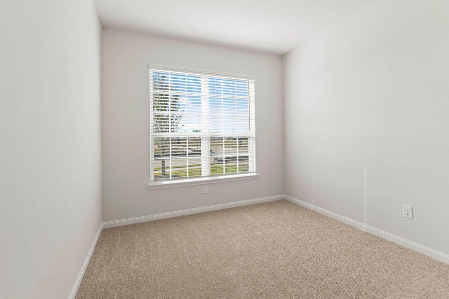 Spacious, unfurnished interior of a new home in Canterra Creek, Iowa Colony (Image 8).