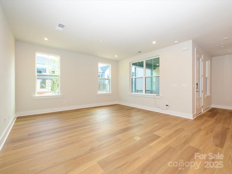 Great Room Surrounded by Large Energy Efficient Windows.