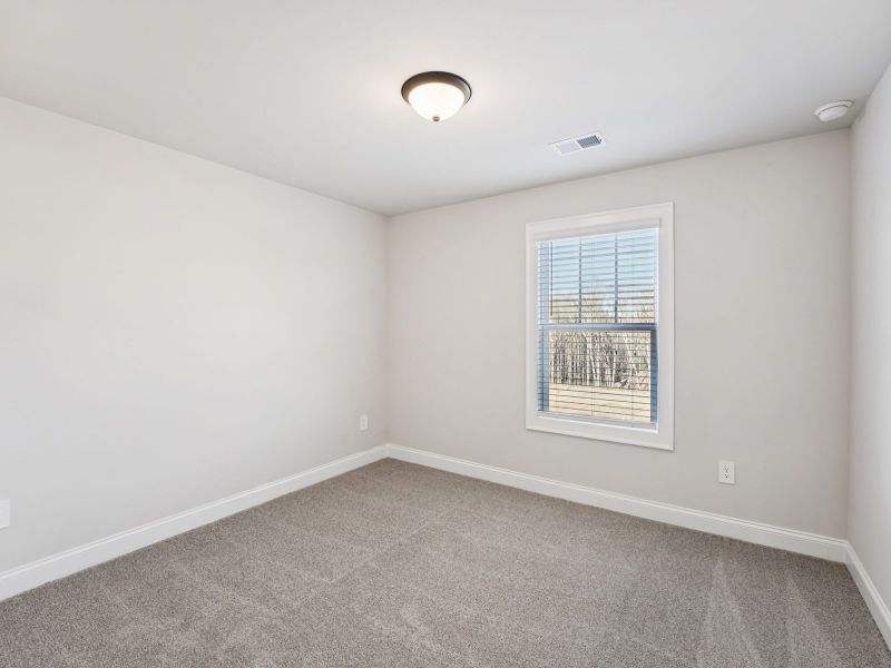 Spacious, unfurnished interior of a new home in Hemingway - Highland Series, Cumming (Image 17).