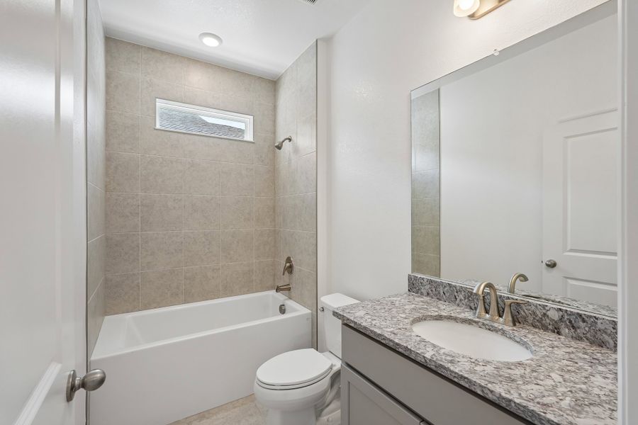 Furnished interior view inside a new home in Heritage Station, Punta Gorda (Image 16).