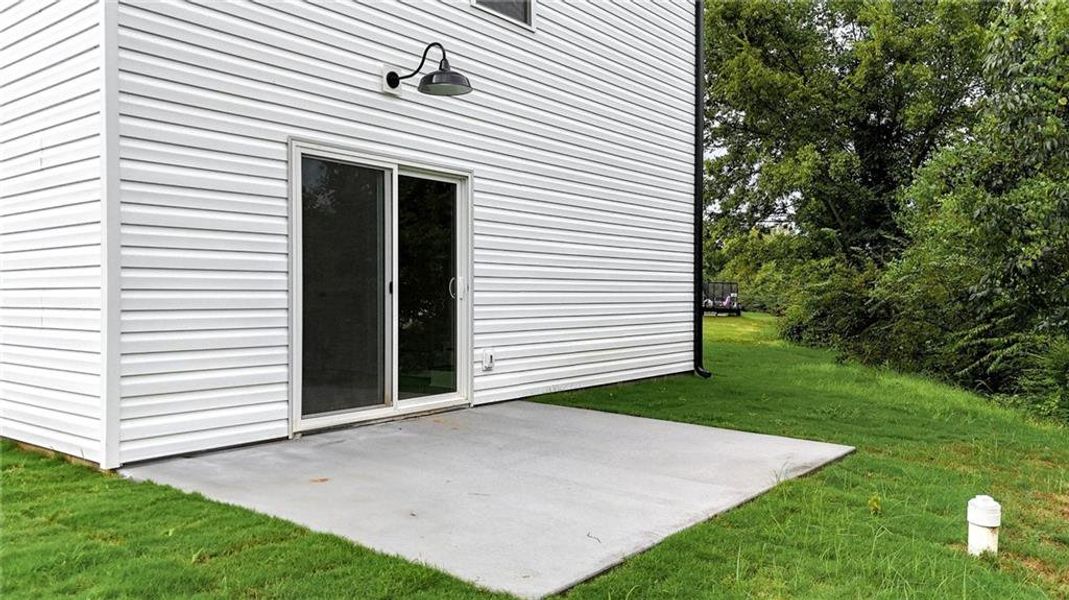 Front exterior of a new home in , Calhoun, GA, highlighting curb appeal (Image 17).
