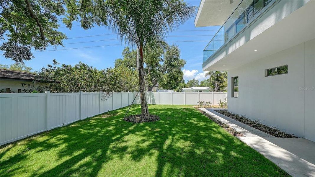 Exterior details and patio area of a home in , Sarasota (Image 33).