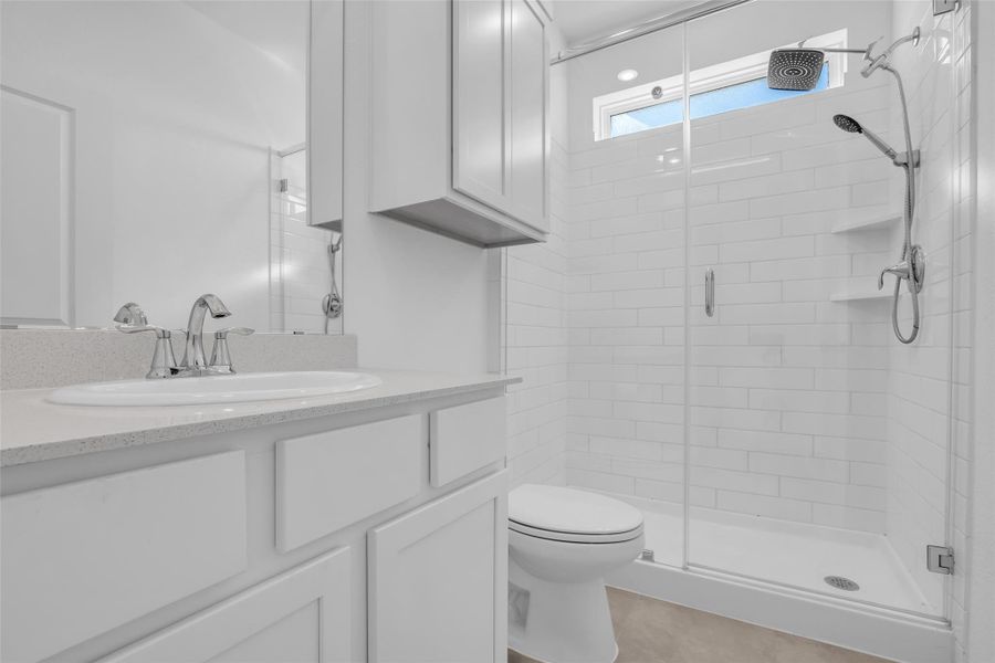 Next Gen Ensuite Bathroom: Bright, refined, and thoughtfully finished with a walk-in glass shower, delivering privacy and ease within the self-contained suite. Next Gen Ensuite Bathroom: Bright, refined, and thoughtfully finished with a walk-in glass shower, delivering privacy and ease within the self-contained suite.