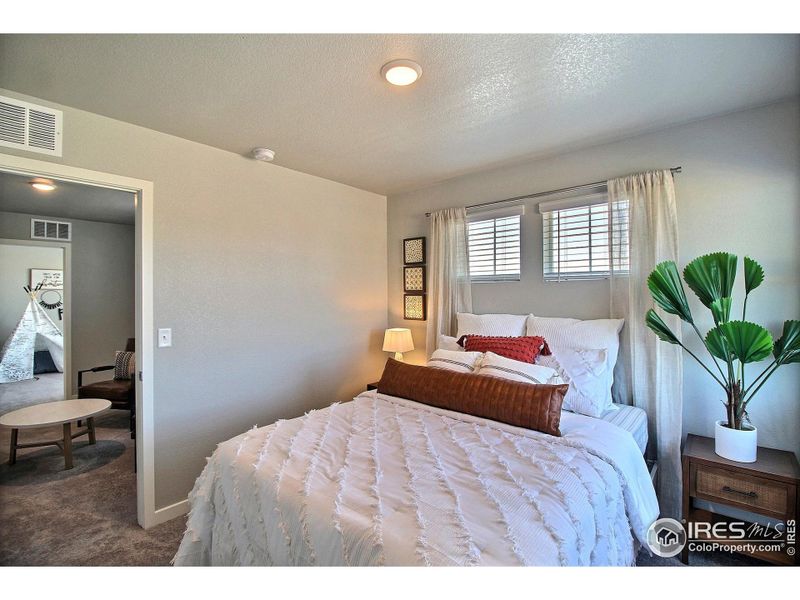 Furnished interior view inside a new home in Liberty Draw, Evans (Image 22).