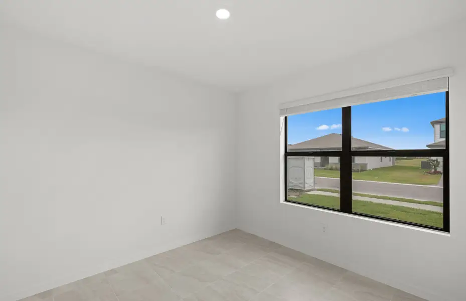 Spacious, unfurnished interior of a new home in Whispering Lakes, Lehigh Acres (Image 15).