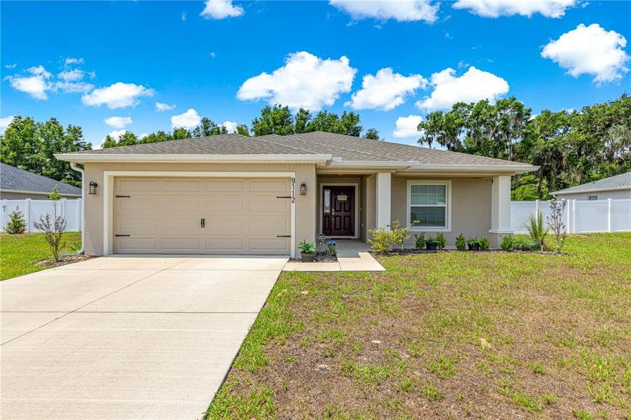 Front exterior of a new home in , Ocala, FL, highlighting curb appeal (Image 26). Front exterior of a new home in , Ocala, FL, highlighting curb appeal (Image 26).