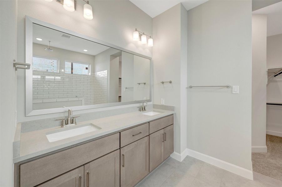 Furnished interior view inside a new home in COLTON - Reserve Collection, Todd Mission (Image 18).