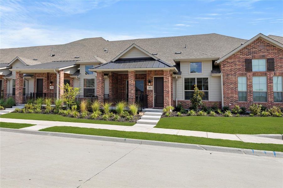 Front exterior of a new home in Woodbridge, Wylie, TX, highlighting curb appeal (Image 1).