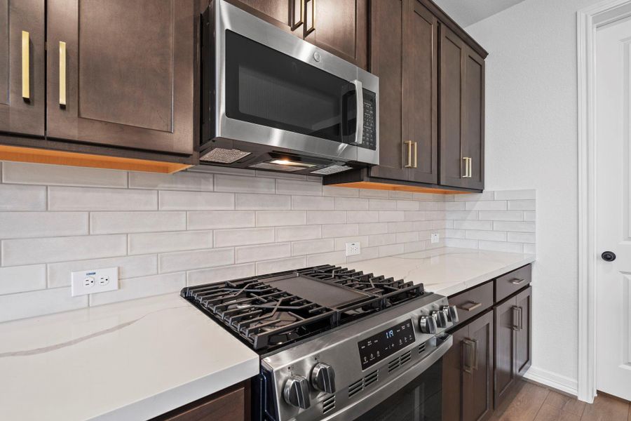 This kitchen is not only a functional space but also has ample storage. Whether you're a seasoned chef or just love to gather and enjoy good food, this kitchen is a dream come true.