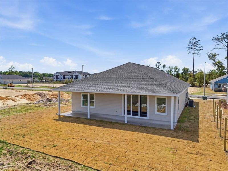 Exterior details and patio area of a home in Grand Oaks, Gainesville (Image 20).