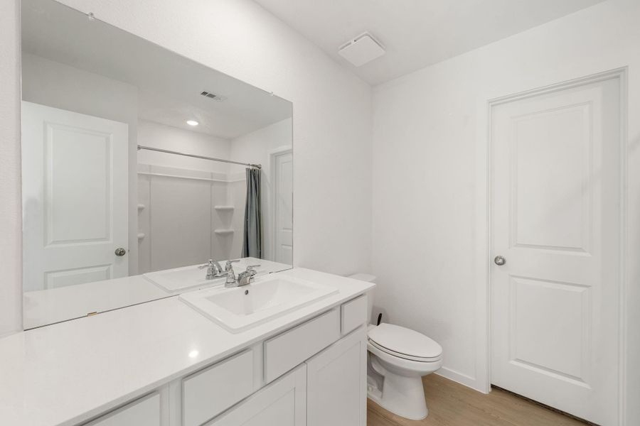 Furnished interior view inside a new home in Emberly: Cottage Collection, Beasley (Image 7).