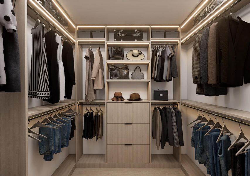 A boutique-style walk-in closet with custom built-ins, soft LED lighting, and dedicated storage designed to keep everything beautifully organized.