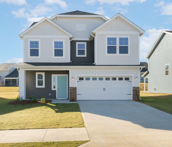 Representative exterior photo of a completed home built from the The Harrison by Cothran Homes in Holly Ridge, Greenville, SC (Image 27). Representative exterior photo of a completed home built from the The Harrison by Cothran Homes in Holly Ridge, Greenville, SC (Image 27).