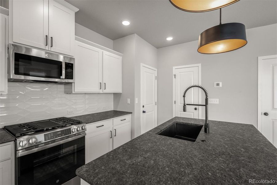 Furnished interior view inside a new home in Revel Crossing at Wolf Ranch – The Ascent Collection, Colorado Springs (Image 7).