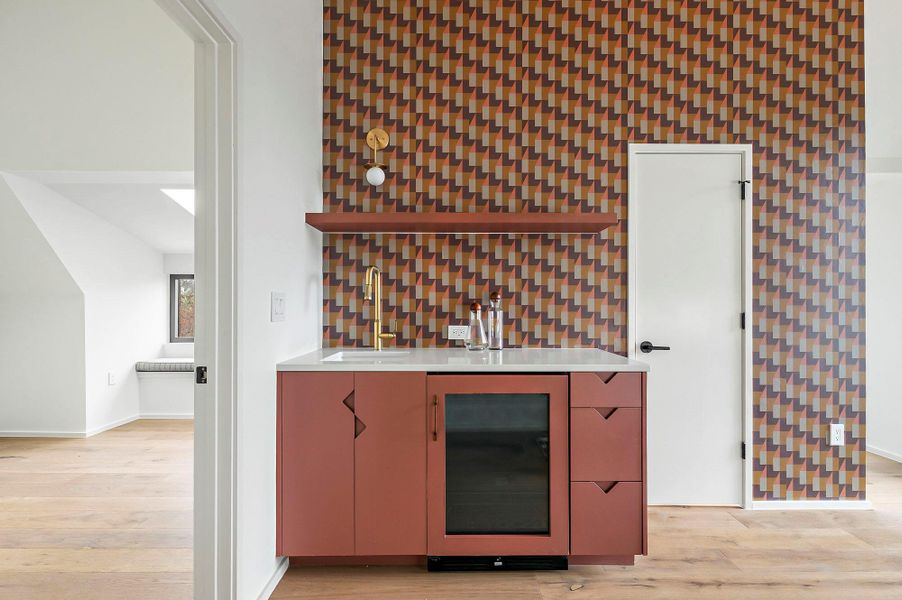 Indoor wet bar with panel ready beverage fridge Indoor wet bar with panel ready beverage fridge