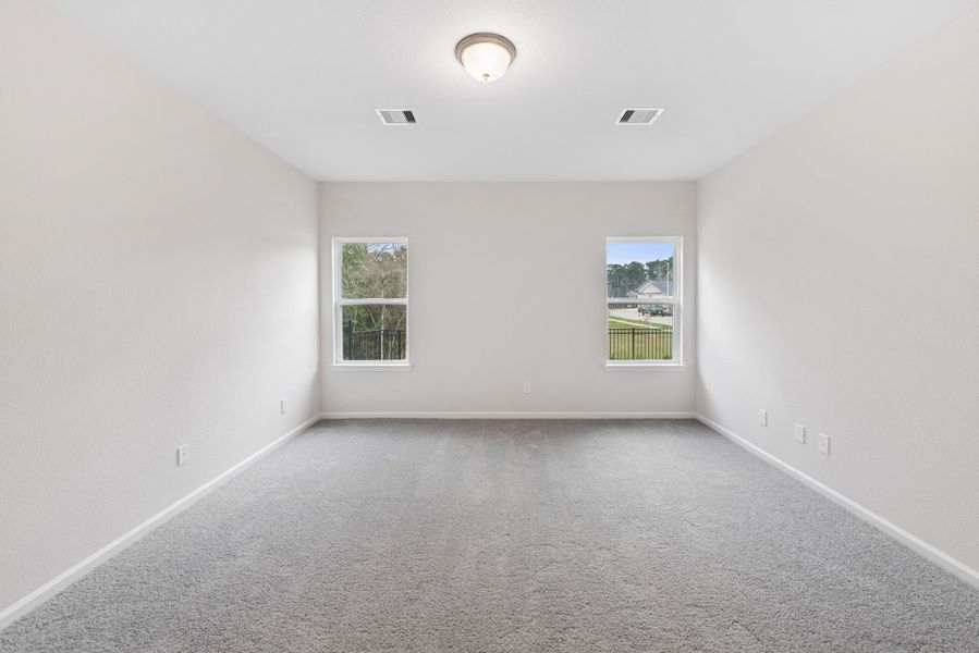 The Cardinal II- Primary Suite. Photos of home shown are for illustration only; actual features, colors, and upgrades may vary.