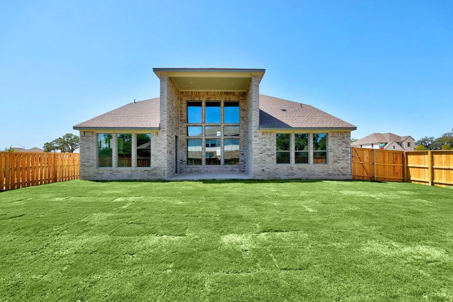 Exterior details and patio area of a home in Parmer Ranch - 60', Georgetown (Image 20).