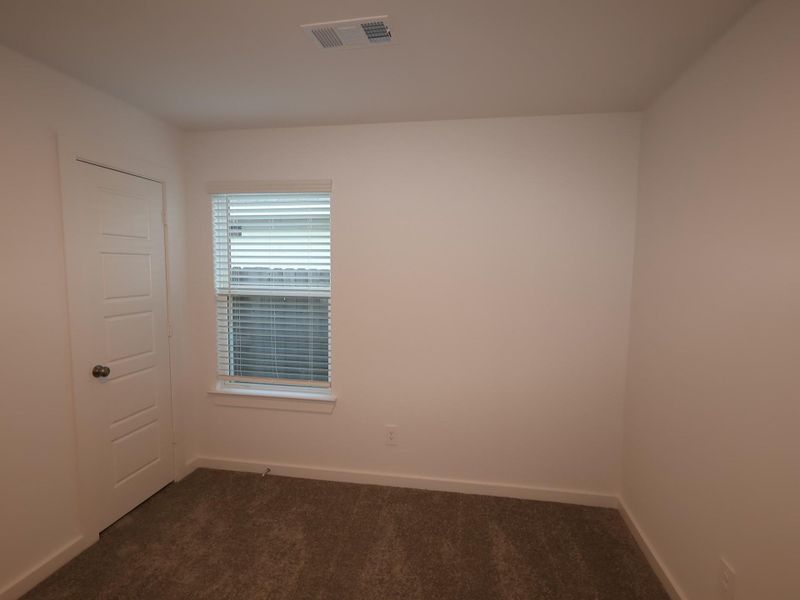 Spacious, unfurnished interior of a new home in Pinewood at Grand Texas, New Caney (Image 5).