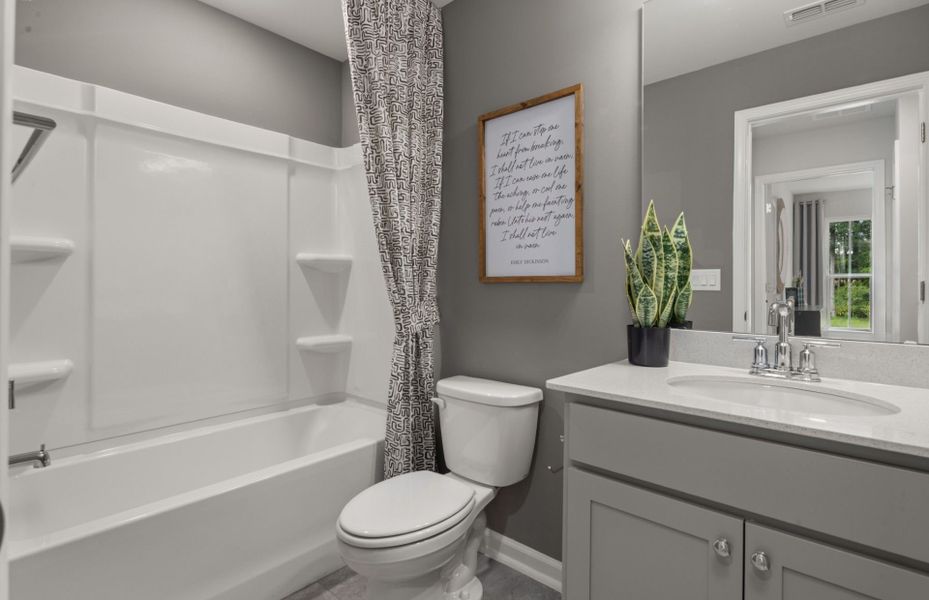 Furnished interior view inside a new home in Poets Walk, Whitsett (Image 18).