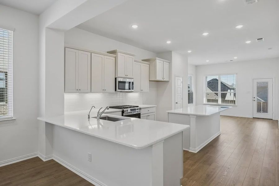 Furnished interior view inside a new home in Bel Air Village, Sherman (Image 6).