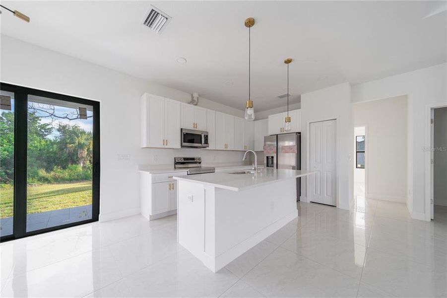 Furnished interior view inside a new home in , Port Charlotte (Image 5). Furnished interior view inside a new home in , Port Charlotte (Image 5).