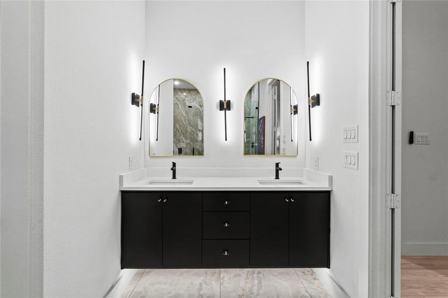 Bathroom with vanity and an enclosed shower