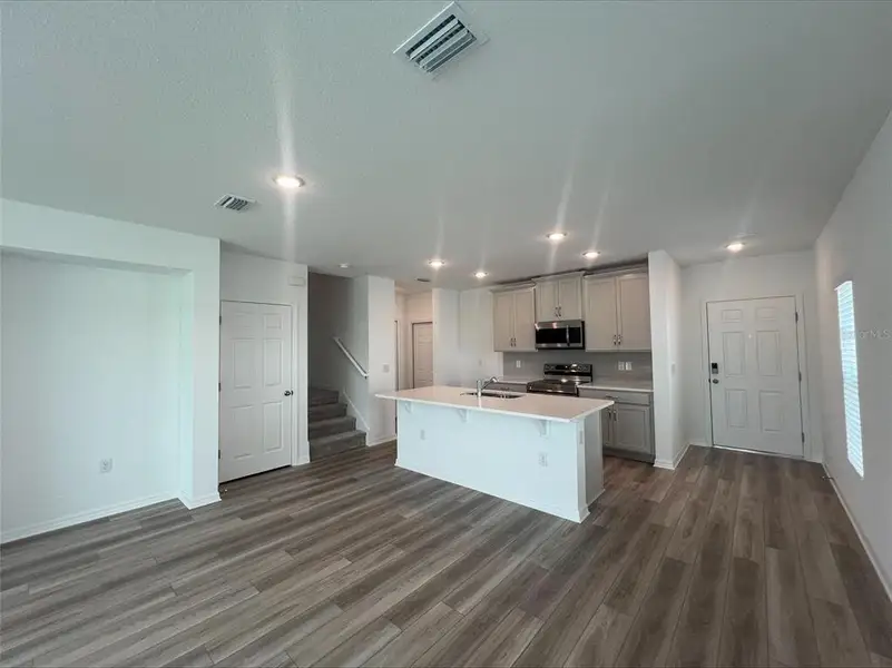 Furnished interior view inside a new home in Thompson Village Townhomes, Apopka (Image 5).