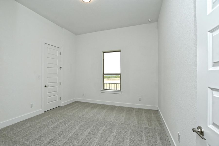 Representative unfurnished interior of a home built from the Madera II by Giddens Homes in Scofield Farms Estates, Georgetown (Image 447).