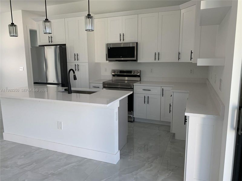 Furnished interior view inside a new home in , Lehigh Acres (Image 9).