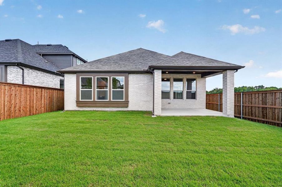 Exterior details and patio area of a home in Meraki, Forney (Image 2).