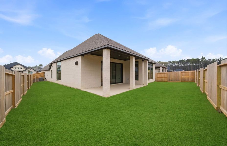 Exterior details and patio area of a home in The Highlands 55′, Porter (Image 25).
