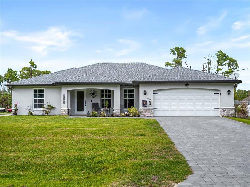 Exterior details and patio area of a home in , Port Charlotte (Image 29).