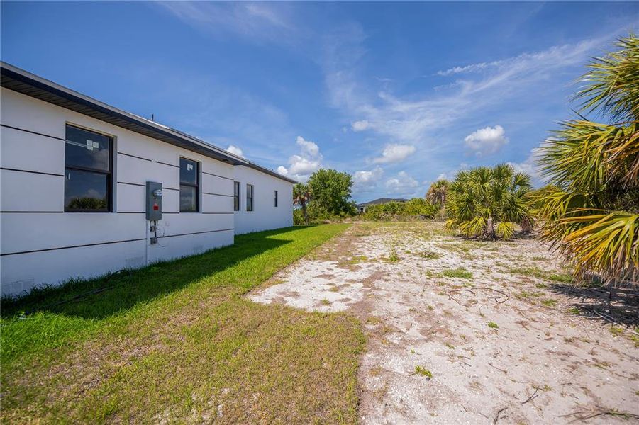 Exterior details and patio area of a home in , Port Charlotte (Image 38).