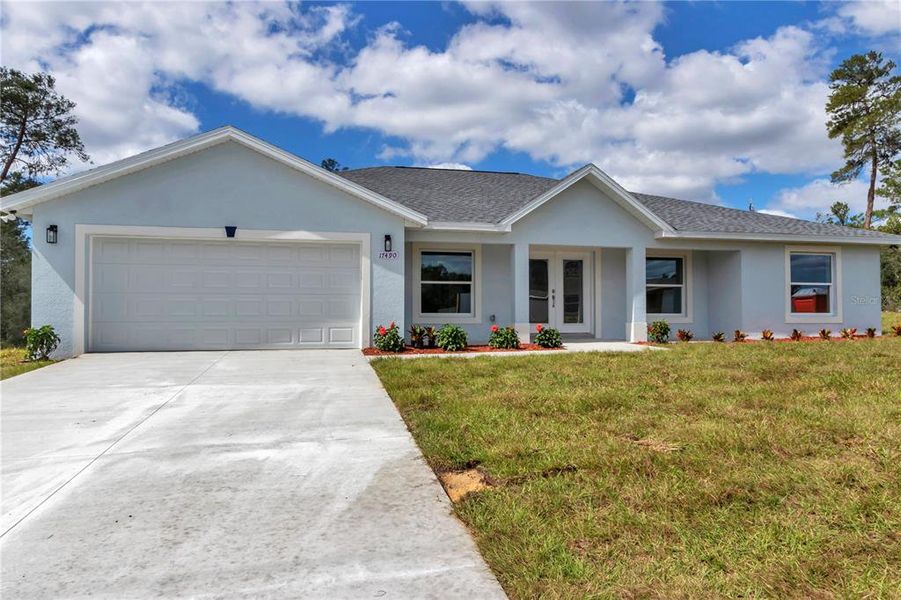 Front exterior of a new home in , Ocala, FL, highlighting curb appeal (Image 28).