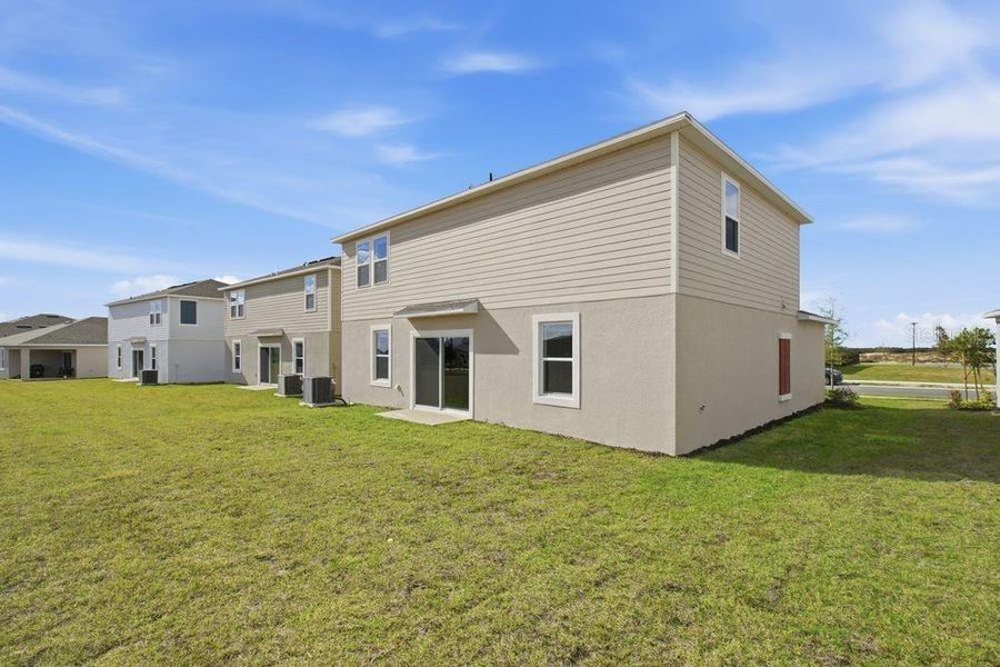 Exterior details and patio area of a home in Waterstone, Groveland (Image 3).