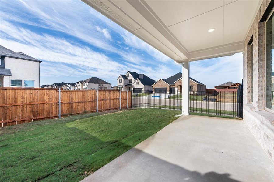 Exterior details and patio area of a home in Villages of Creekwood, Frisco (Image 3).