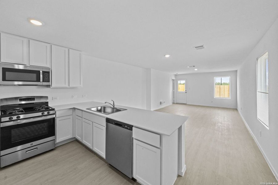 Furnished interior view inside a new home in Spring Grove, St. Hedwig (Image 5).