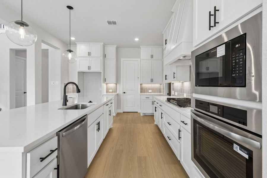 Furnished interior view inside a new home in Rainwater Crossing, Celina (Image 10).