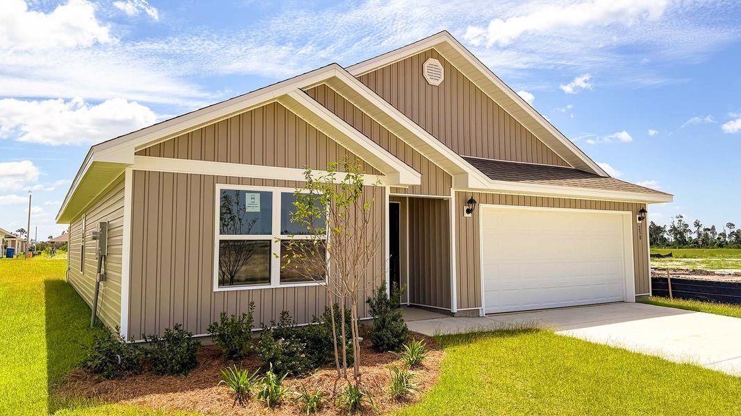 Front exterior of a new home in Park Place, Panama City, FL, highlighting curb appeal (Image 2). Front exterior of a new home in Park Place, Panama City, FL, highlighting curb appeal (Image 2).
