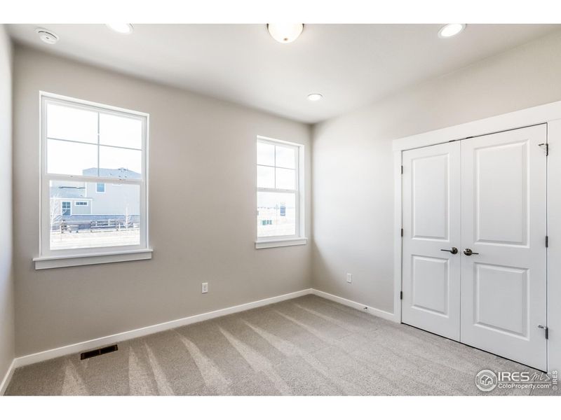 Spacious, unfurnished interior of a new home in Barefoot Lakes, Firestone (Image 22).