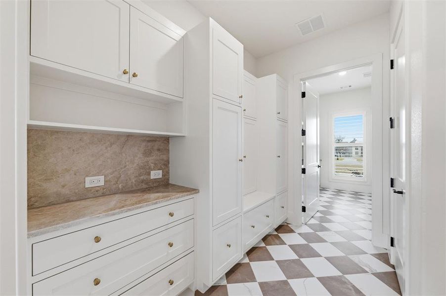 Mudroom view from kitchen into laundry room